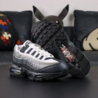 Yu-Gi-Oh x Air Max Muscle 95 QS Jonouchi 2025 — outsole bottom view with Yu-Gi-Oh graffiti logo on heel