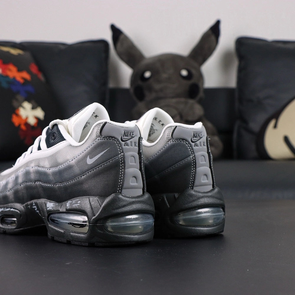 Yu-Gi-Oh x Air Max Muscle 95 QS Jonouchi 2025 — heel close-up grey Air unit and NK AIR counter