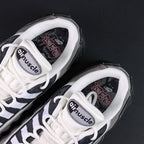 Yu-Gi-Oh x Air Max Muscle 95 QS Jonouchi 2025 — tongue air muscle label and Yu-Gi-Oh insole detail