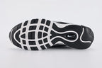Air Max 97 Black Metallic Silver - Toe Box Close Up on White Background Showing Black Smooth Leather Toe Box White Fine-Diamond Ripstop Mesh Quarter Panel Three Metallic Silver Reflective Stripe Bands and White Mini Swoosh on Lateral Toe Box