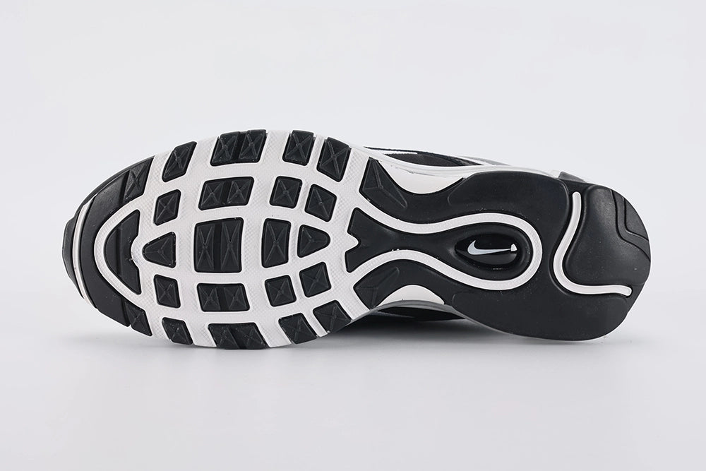 Air Max 97 Black Metallic Silver - Toe Box Close Up on White Background Showing Black Smooth Leather Toe Box White Fine-Diamond Ripstop Mesh Quarter Panel Three Metallic Silver Reflective Stripe Bands and White Mini Swoosh on Lateral Toe Box