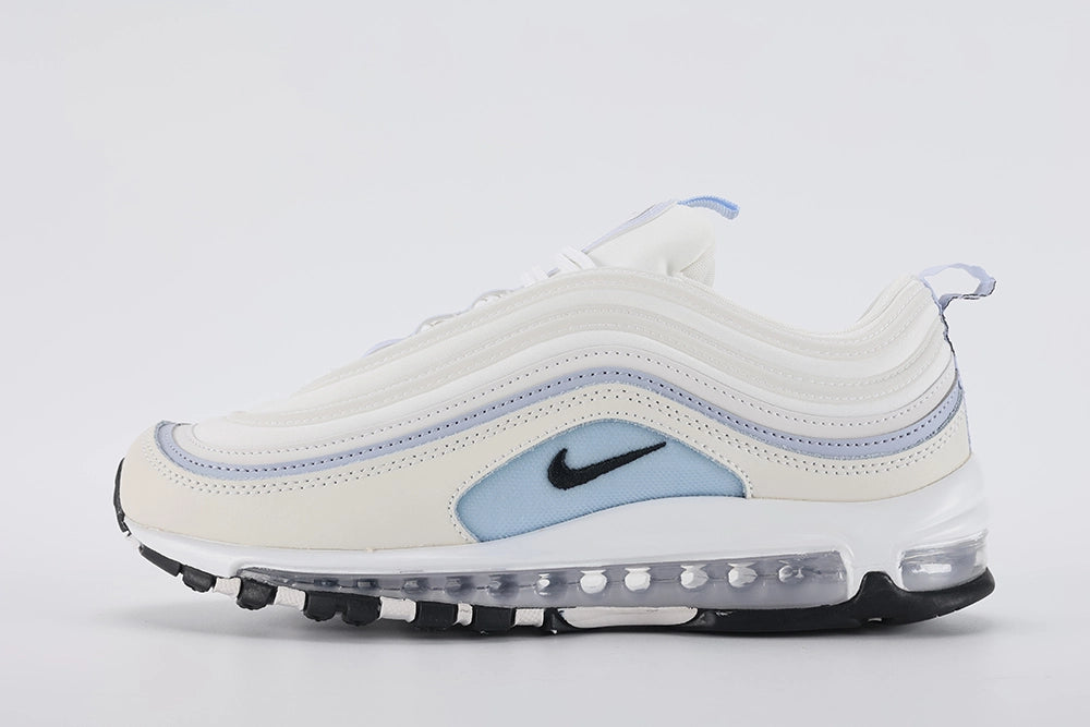 Air Max 97 Ghost - Toe Box Close Up on White Background Showing Sail Perforated Leather with Dense Small-Circle Perforation Pattern White Fine Mesh Quarter Panel Ghost Blue Wave Stripe Bands and Black Mini Swoosh Logo on Lateral Toe Box