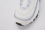 Air Max 97 Ghost - Full Lateral Profile View with Red Shoebox on White Background Showing Complete Sail Perforated Leather AM97 Upper Three Ghost Blue Wave Stripe Bands Large Ghost Blue Suede Lateral Midfoot Panel and Transparent AM97 Air Unit