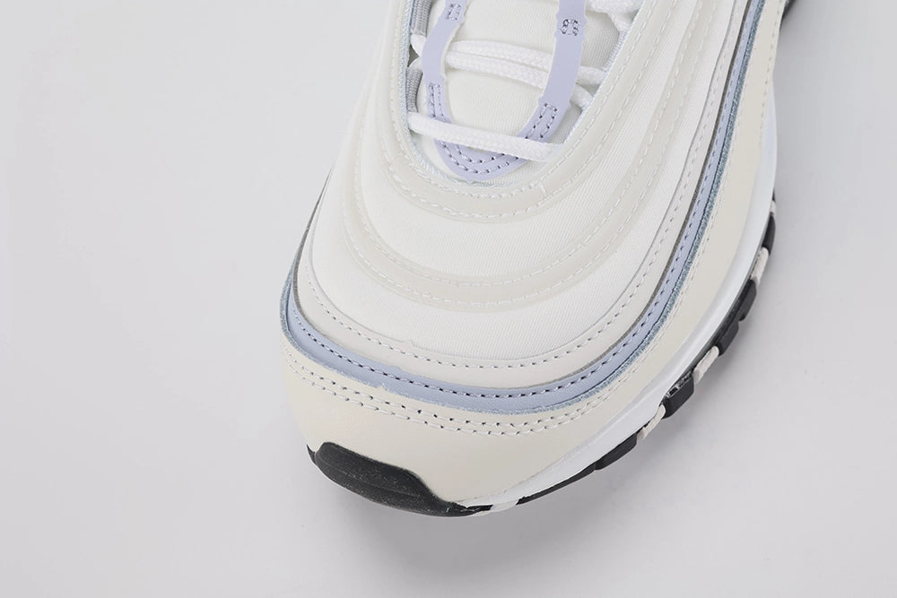 Air Max 97 Ghost - Full Lateral Profile View with Red Shoebox on White Background Showing Complete Sail Perforated Leather AM97 Upper Three Ghost Blue Wave Stripe Bands Large Ghost Blue Suede Lateral Midfoot Panel and Transparent AM97 Air Unit