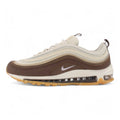 Air Max 97 Muslin Pink Foam - Full Lateral Profile View on White Background Showing Dark Baroque Brown Leather Toe Box Muslin Burlap-Weave Mesh Quarter Panel Three-Tone Graduated Brown Wave Stripe Bands and White Midsole with Pink Foam Accent Line and Gum Outsole