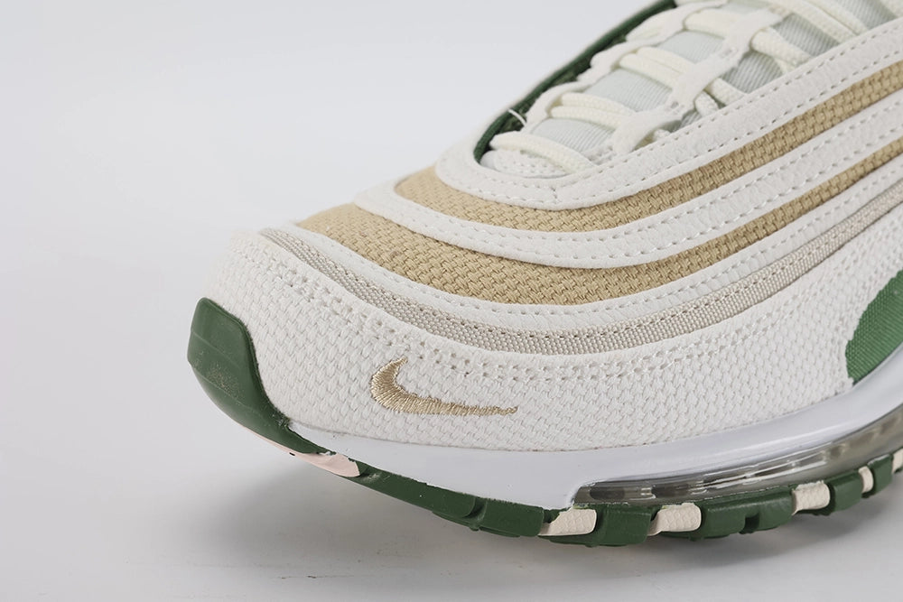 Air Max 97 SE Sun Club Sail Treeline - Toe Box Close Up on White Background Showing Sail Fine Perforated Mesh Toe Box Tan Khaki Coarse Burlap-Weave Mesh Mid-Stripe Silver Metallic Fine Woven Textile Lower Stripe and Tan Swoosh Embroidery on Lateral Toe Box