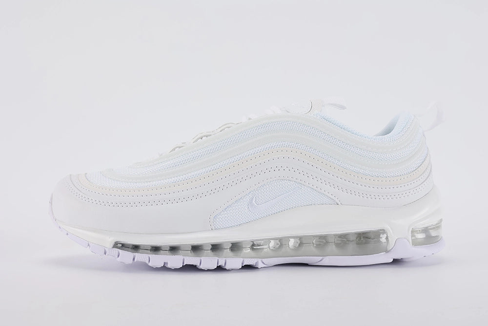 Air Max 97 Triple White - Lateral Midfoot Close Up on White Background Showing White Iridescent Mesh Quarter Panel with Subtle Iridescent Blue-Purple Light Shift Three Tonal White Wave Stripe Bands and White Midsole with Clear Heel Air Unit