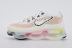 Air Max Scorpion Air Max Day - Toe Box and Quarter Panel Close Up on White Background Showing White Fine-Knit Flyknit Toe Box Multicolour Rainbow Flyknit Stripe Bands Pink Volt Mint Green Sky Blue and Frosted White AM Scorpion Multi-Chamber Midsole at Forefoot