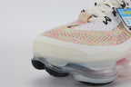 Air Max Scorpion Air Max Day - Tongue and Lace Area Top Down View on White Background Showing White Terry Cloth Tongue with Teal Interior Lining Black Mini Swoosh Embroidery Black X-Form Lace Locks and White Flyknit Toe Box with Multicolour Rainbow Quarter Panel