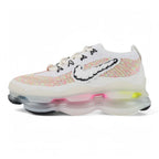 Air Max Scorpion Air Max Day - Full Lateral Profile View on White Background Showing White Flyknit AM Scorpion Upper Multicolour Rainbow Flyknit Stripe Bands Black Sketch Outline Swoosh on Lateral Midfoot Black X-Form Lace Locks and Full-Length Frosted White Multi-Chamber Air Scorpion Midsole with Pink and Volt Air Chambers