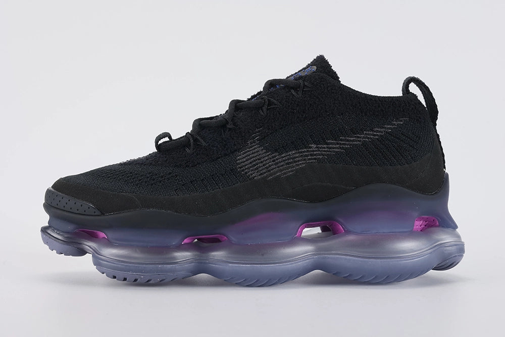 Air Max Scorpion Flyknit Black Persian Violet - Toe Box Close Up on White Background Showing Black Fine-Knit Flyknit Toe Box with Small-Hole Ventilation Structure Black Perforated Leather Toe Cap and Persian Violet Slate Blue Gradient AM Scorpion Air Unit at Forefoot with Fuchsia Air Chambers Visible