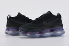 Air Max Scorpion Flyknit Black Persian Violet - Full Outsole View on White Background Showing Full-Coverage Slate Blue Semi-Transparent AM Scorpion Air Base Fuchsia Magenta Air Chamber Bases at Central Zone Persian Violet Chambers at Midfoot and Full-Coverage Chevron Traction Texture