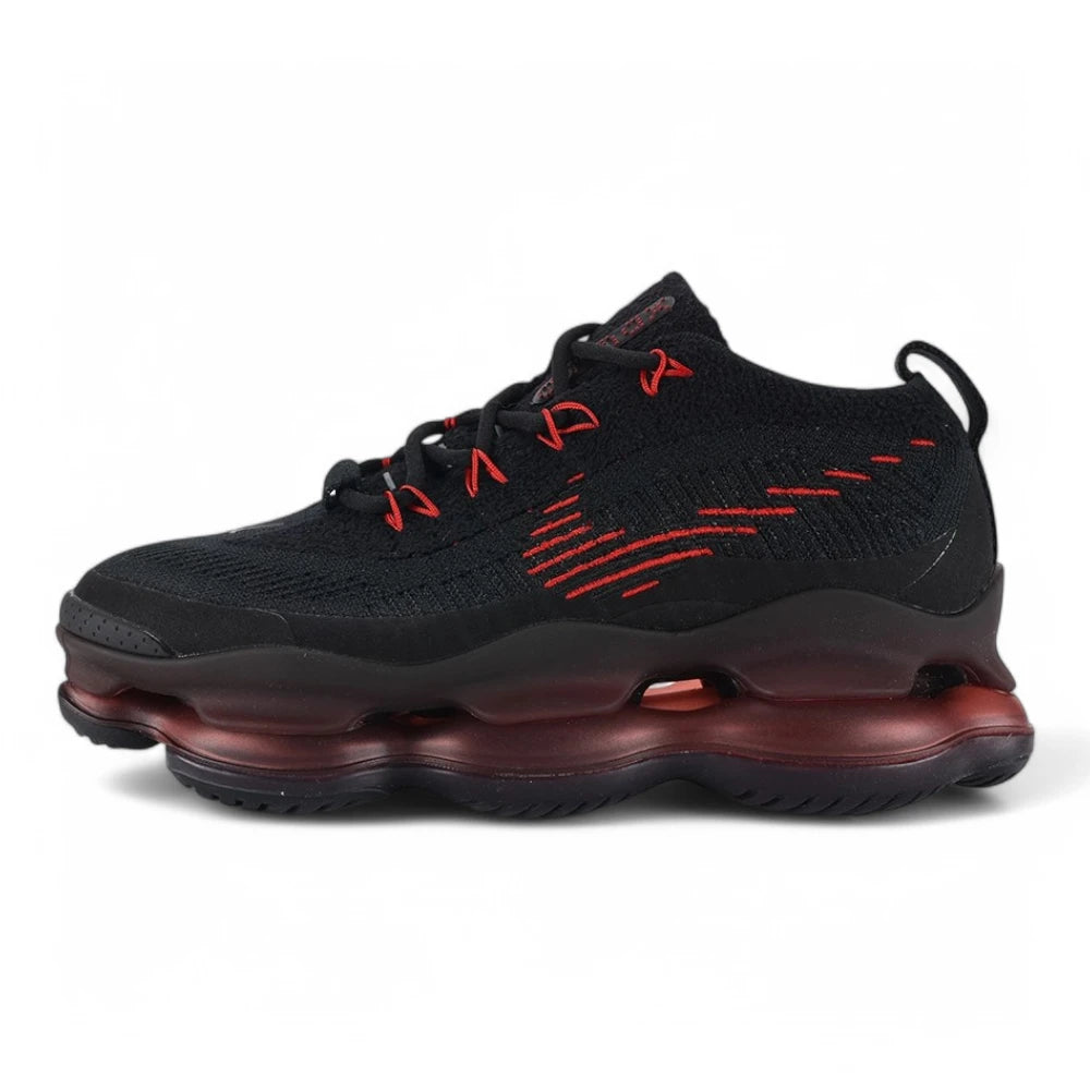 Air Max Scorpion Flyknit Bred Black University Red - Full Lateral Profile View on White Background Showing Black Coarse Loop-Pile Flyknit AM Scorpion Flyknit Upper Black Perforated Leather Toe Cap Red Oval Lace Locks University Red Paracord Lace Red Accent Stitching Lines and Deep Burgundy to Black Gradient AM Scorpion Air Unit