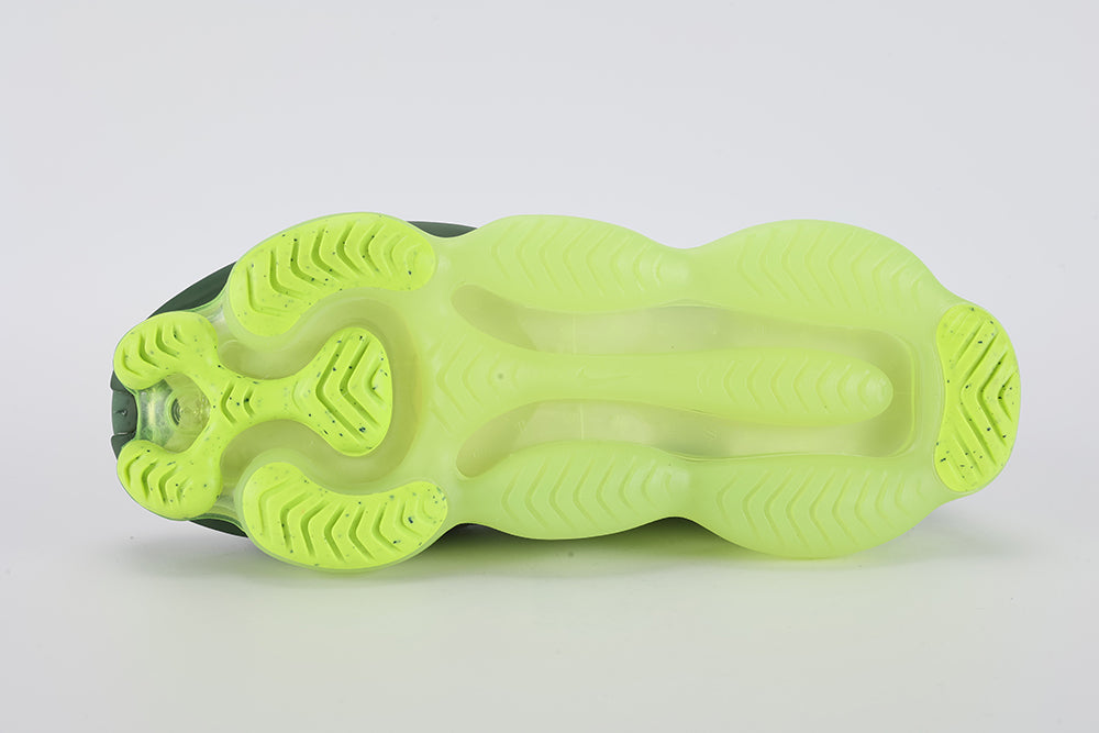 Air Max Scorpion Flyknit Cargo Khaki Volt - Heel Counter Close Up on White Background Showing White Horizontal Flyknit Stripe Bands Extending to Lateral Heel Panel Volt Oval Heel Pull Tab with White Dot-Grid Texture Cargo Khaki High Ankle Collar with Deep Forest Green Interior Lining and Volt to Forest Green Gradient AM Scorpion Air Unit at Heel