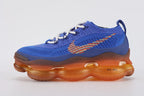 Air Max Scorpion Flyknit Frank Rudy Game Royal Total Orange - Toe Box Close Up on White Background Showing Game Royal Coarse Loop-Pile Flyknit Toe Box Total Orange Mini Swoosh Embroidery Dark Navy Lace Locks White Rope Lace and Total Orange AM Scorpion Air Unit at Forefoot with Dark Brown Speckle Midsole Sidewall Top Edge