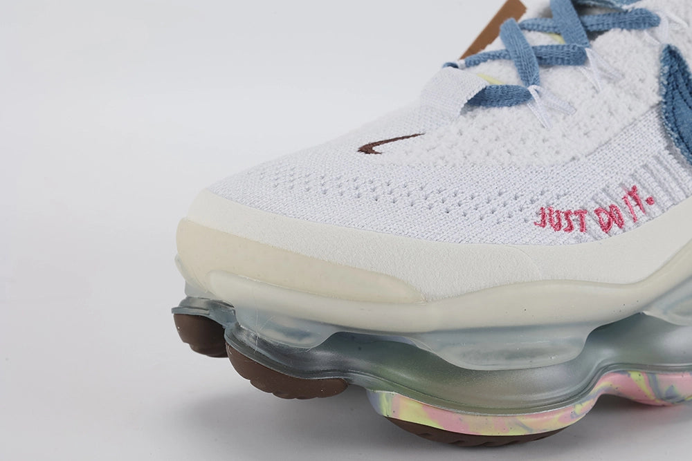 Air Max Scorpion Flyknit Just Do It White Diffused Blue - Rear View of Both Shoes on White Background Showing Teal and Pink Dragonfly Embroidery on Heel Counter Lateral Side Diffused Blue Terry Cloth Wide Heel Pull Tabs with Black JUST DO IT Text Print and Frosted Grey AM Scorpion Air Unit with Multicolour Iridescent Pink Volt Blue Outsole
