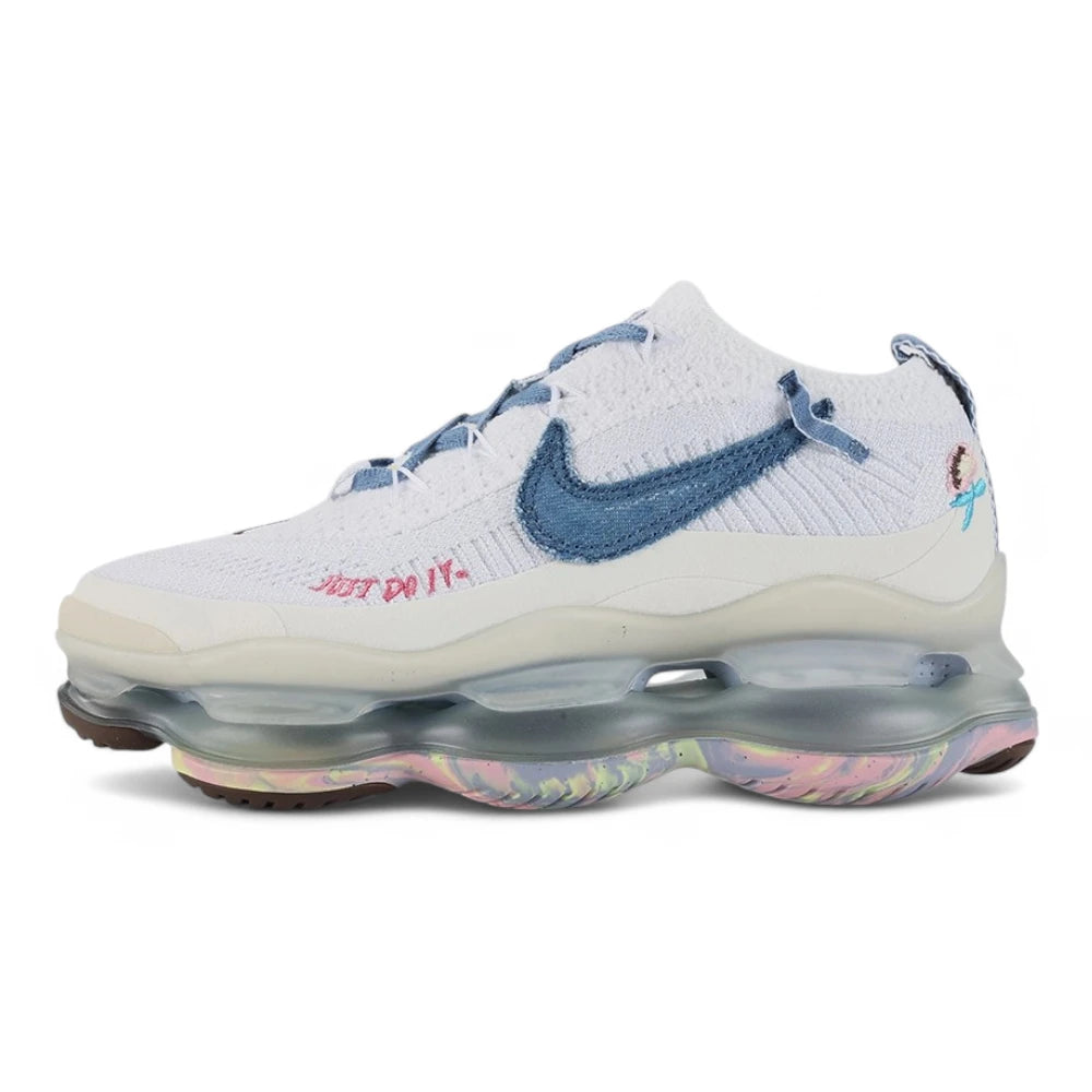 Air Max Scorpion Flyknit Just Do It White Diffused Blue - Full Lateral Profile View on White Background Showing White Dual-Texture Flyknit AM Scorpion Upper Diffused Blue Terry Cloth Swoosh Patch with Raw Edges Hot Pink JUST DO IT Slogan Embroidery Diffused Blue Terry Laces and Frosted Grey AM Scorpion Air Unit with Multicolour Iridescent Outsole