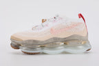 Air Max Scorpion Flyknit Leap High 2 Guava Ice Teal University Red - Toe Box Top Down View on White Background Showing Guava Ice Fine-Knit Flyknit Toe Box with Small-Hole Ventilation Teal Mini Swoosh Embroidery Pink Cherry Blossom Embroideries on Quarter Panel and Frosted Clear AM Scorpion Air Unit at Forefoot with Gum Traction Pods