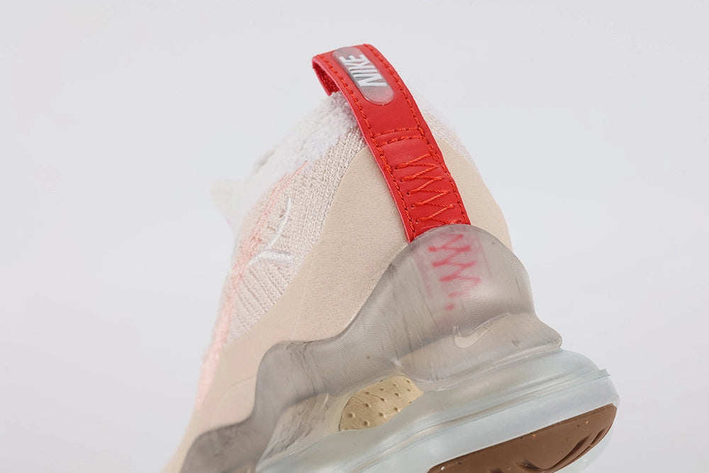 Air Max Scorpion Flyknit Leap High 2 Guava Ice Teal University Red - Rear View of Both Shoes on White Background Showing University Red Wide Leather Heel Straps with White Text Print and Red Clasp Hardware Ultra-High Ankle Collar Guava Ice Air Chambers and Pink Text Print Visible Through Frosted Clear AM Scorpion Air Unit at Heel with Gum Traction Pods