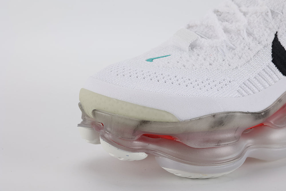 Air Max Scorpion Flyknit Leap High White Black Teal University Red - Collar Interior Close Up on White Background Showing White LEAP HIGH 2023 JUST DO IT Interior Shoe Tag with Red Swoosh Icon Black Large Brand Text on White Terry Flyknit Collar Interior and University Red Lining at Collar Top