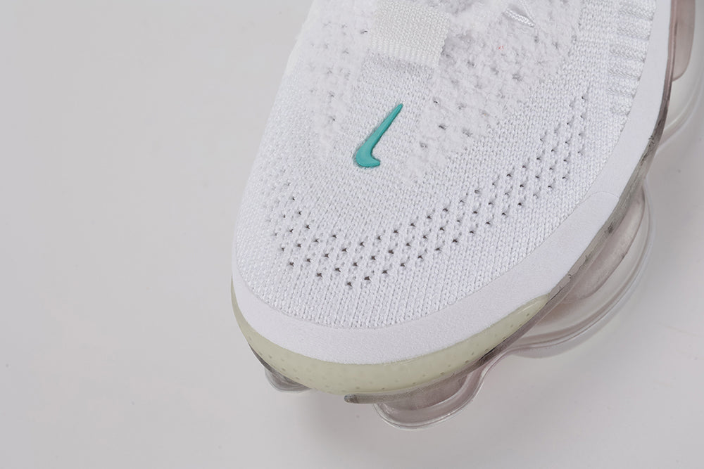 Air Max Scorpion Flyknit Leap High White Black Teal University Red - Full Outsole View on White Background Showing Frosted White Semi-Transparent AM Scorpion Air Base University Red Central Air Chamber Bases Pink Central Air Chamber Bases University Red Circular Rubber Accent Dots at Heel and Full-Coverage White Chevron Traction Texture