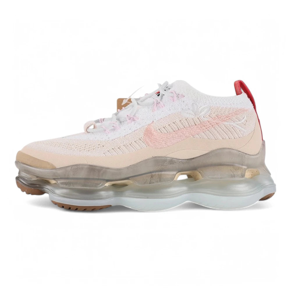 Air Max Scorpion Flyknit Leap High 2 Guava Ice Teal University Red - Full Lateral Profile View on White Background Showing Guava Ice Fine-Knit Flyknit Laceless AM Scorpion Upper Pink Cherry Blossom Embroidery Teal Mini Swoosh University Red Wide Leather Heel Strap with Red Clasp and Frosted Clear AM Scorpion Air Unit with Gum Traction Pods