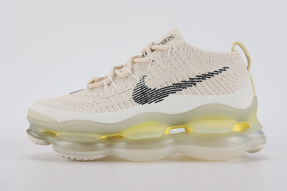 Air Max Scorpion Flyknit Lemon Wash Light Orewood Brown Lemon Chiffon - Toe Box Top Down View on White Background Showing Light Orewood Brown Boucle Flyknit Toe Box with Silver Metallic Thread Black Mini Swoosh Embroidery Tonal Off-White Flat Laces Silver Oval Lace Keepers with Black Dot-Grid Texture and Frosted Ice AM Scorpion Air Unit at Forefoot with Lemon Chiffon Chambers