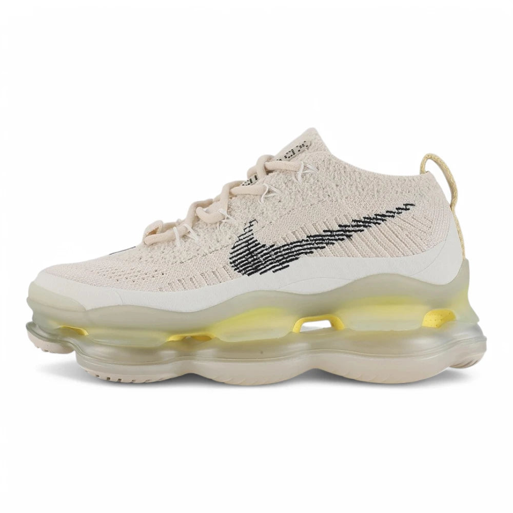 Air Max Scorpion Flyknit Lemon Wash Light Orewood Brown Lemon Chiffon - Full Lateral Profile View on White Background Showing Light Orewood Brown Boucle Flyknit AM Scorpion Upper with Silver Metallic Thread Black Sketch-Outline Swoosh on Lateral Midfoot Tonal Off-White Flat Laces Silver Oval Lace Keepers with Black Dot-Grid Texture Lemon Chiffon Heel Pull Tab and Frosted Ice AM Scorpion Air Unit with Lemon Chiffon Chambers