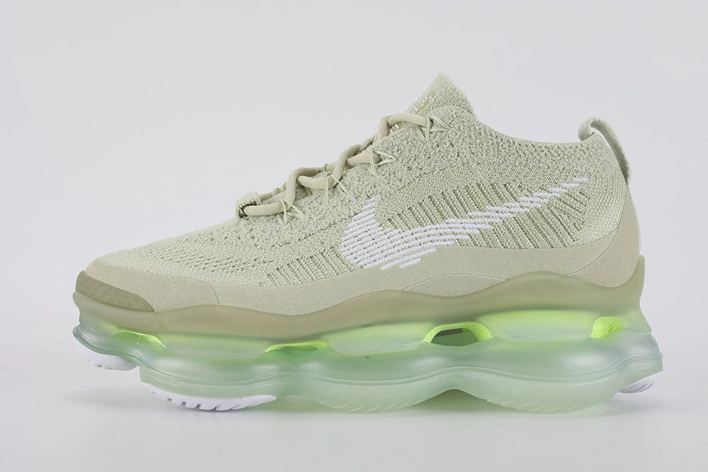 Air Max Scorpion Flyknit Olive Aura Light Bone Sea Glass Volt - Full Outsole View on Grey Background Showing Sea Glass Semi-Transparent AM Scorpion Air Base Volt Neon Yellow Central Air Chamber Bases Ice Green Central Air Bottom Zone and White Chevron Traction Pods at Forefoot and Heel