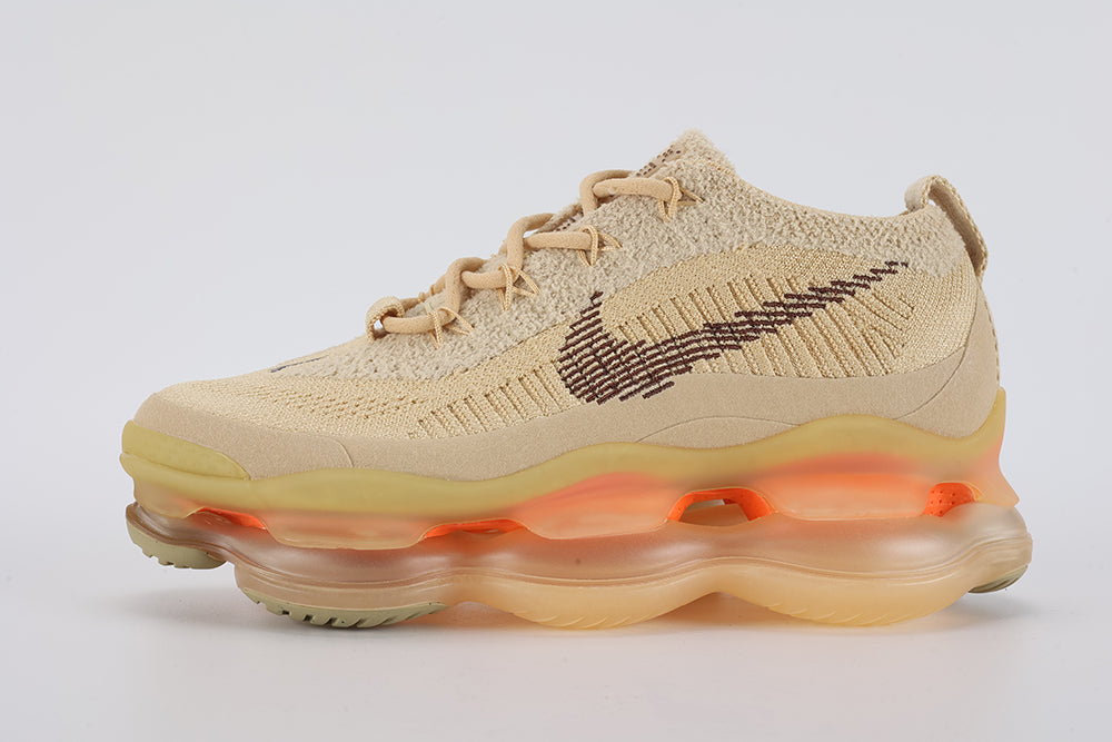 Air Max Scorpion Flyknit Sesame Dark Driftwood Total Orange - Toe Box Top Down View on White Background Showing Sesame Fine-Knit Flyknit Toe Box with Gold Metallic Thread Dark Driftwood Mini Swoosh Embroidery Tonal Sesame Rope Laces Sesame Lace Keeper with Dark Driftwood Dot-Grid Texture and Lemon Chiffon AM Scorpion Air Unit at Forefoot