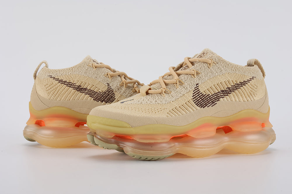 Air Max Scorpion Flyknit Sesame Dark Driftwood Total Orange - Full Outsole View on White Background Showing Lemon Chiffon Semi-Transparent AM Scorpion Air Base Total Orange Central Air Chamber Bases Sage Muted Olive-Green Rubber Chevron Traction Pods at Forefoot and Heel Corners and Orange Circular Rubber Accent Dots at Heel