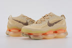 Air Max Scorpion Flyknit Sesame Dark Driftwood Total Orange - Full Outsole View on White Background Showing Lemon Chiffon Semi-Transparent AM Scorpion Air Base Total Orange Central Air Chamber Bases Sage Muted Olive-Green Rubber Chevron Traction Pods at Forefoot and Heel Corners and Orange Circular Rubber Accent Dots at Heel