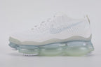 Air Max Scorpion Flyknit White Football Grey Ice Blue - Toe Box Close Up on Grey Background Showing White Fine-Knit Flyknit with Grey Speckle Dots White Tonal Mini Swoosh White Flat Laces and Frosted Ice AM Scorpion Air Unit at Forefoot with Ice Blue Chambers