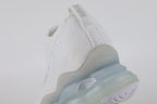 Air Max Scorpion Flyknit White Football Grey Ice Blue - Lace Area and Collar Close Up on Grey Background Showing White Terry Loop-Pile Flyknit with Silver Metallic Thread White Iridescent Flyknit on Lateral Midfoot White Tonal Sketch-Outline Swoosh White Flat Laces and Frosted Ice AM Scorpion Air Unit