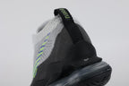 Air Max Scorpion Flyknit Wolf Grey Volt Racer Blue Black - Collar and Lace Area Close Up on Grey Background Showing White Terry Loop-Pile Flyknit Collar Wolf Grey Fine-Knit Flyknit with Volt and Racer Blue Knit Stripes White Flat Laces Racer Blue Dot-Matrix on Collar Interior and Black AM Scorpion Air Unit
