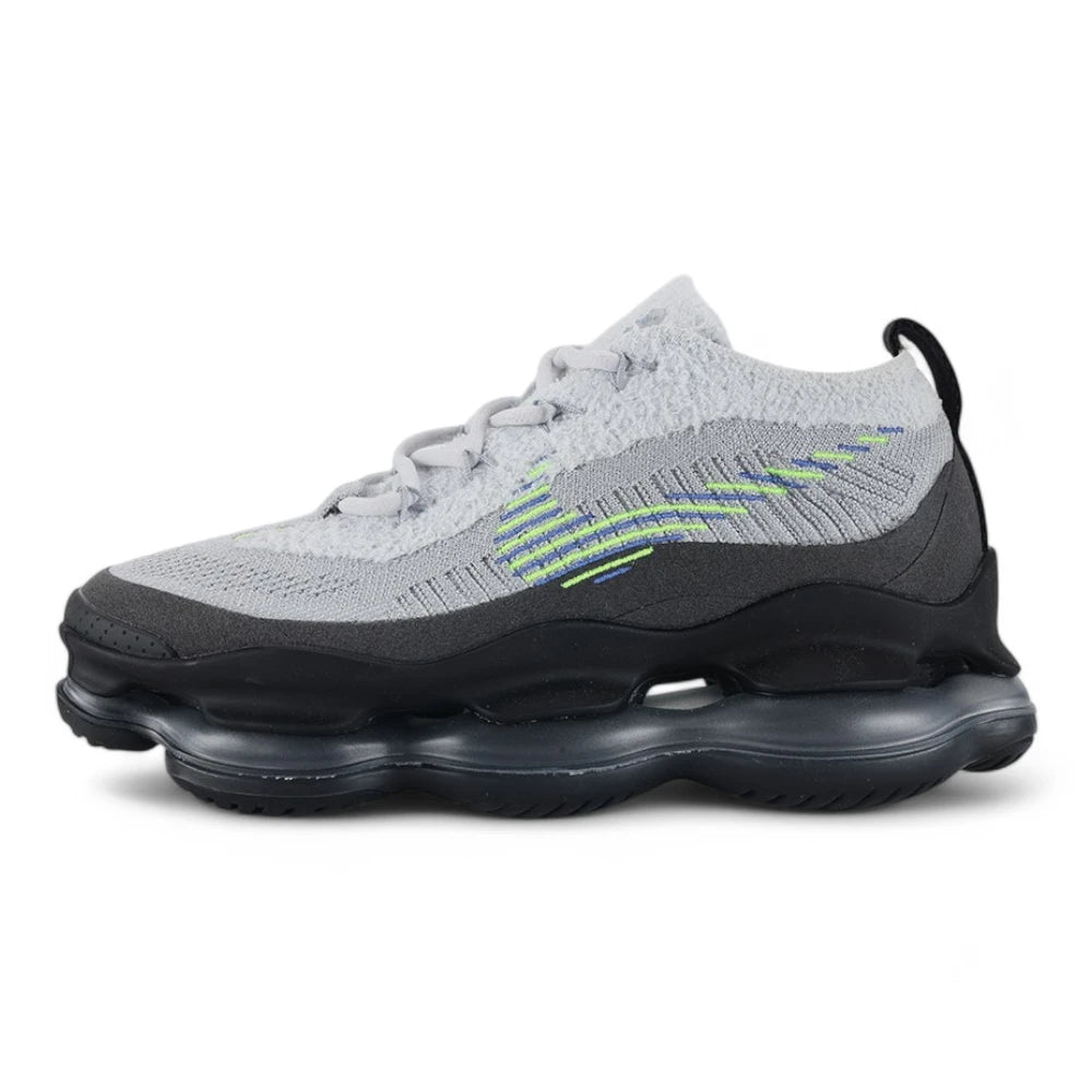 Air Max Scorpion Flyknit Wolf Grey Volt Racer Blue Black - Full Lateral Profile View on Grey Background Showing Wolf Grey Fine-Knit Flyknit AM Scorpion Upper with Volt and Racer Blue Knit Stripes White Terry Collar Volt Mini Swoosh on Toe Box Dark Grey Perforated Suede Overlay White Flat Laces and Black to Dark Grey AM Scorpion Air Unit