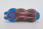 Air Max Scorpion Hiking - Heel Counter Close Up on White Background Showing Wide Tan Leather Heel Pull Tab with White Contrast Stitching and H-Form Stitch Structure Black Sketch Swoosh Extending to Lateral Heel Panel and Sail Speckle-Print Midsole with Pink Air Chambers Visible