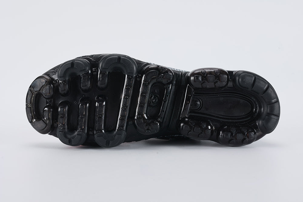 Air VaporMax co-branded The Ten Black White Red - Toe Box Top Down View on White Background Showing Black Fine-Knit Flyknit Toe Box White Flat Laces Red Industrial Zip Tie with Serrated Edge White Rectangular MADE IN CHINA Hang Tag and Dark Grey Flyknit Zone at Lower Lateral