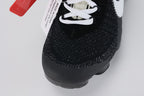 Air VaporMax co-branded The Ten Black White Red - Rear View of Both Shoes on White Background Showing Grey Woven Collar Band at Collar Top Black Woven Heel Pull Tabs with Orange Rectangular Accent VAPORMAX Text on Heel Counter White AIR Quotation-Mark Text at Heel Midsole Junction Red Industrial Zip Tie and Full Black VaporMax Air Unit at Heel